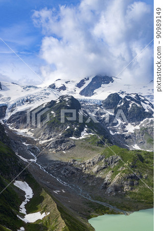 Typical alpine landscape of Swiss Alps with Steinsee, Urner Alps, Canton of Bern, Switzerland Typical alpine landscape of Swiss Alps with Steinsee, Urner Alps, Canton of Bern, Switzerland 90989149