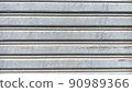 wave steel metal sheet color silver gray. Texture background 90989366