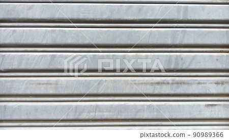 wave steel metal sheet color silver gray. Texture background 90989366
