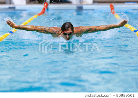 Young muscular man, professional swimmer in - Stock Photo [90989501] -  PIXTA