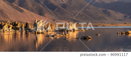Tufa towers rock formation in Mono Lake. Sunny Sunrise. Tufa towers rock formation in Mono Lake. Sunny Sunrise. 90991117