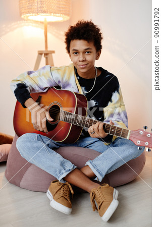 Teen Boy with Guitar 90991792