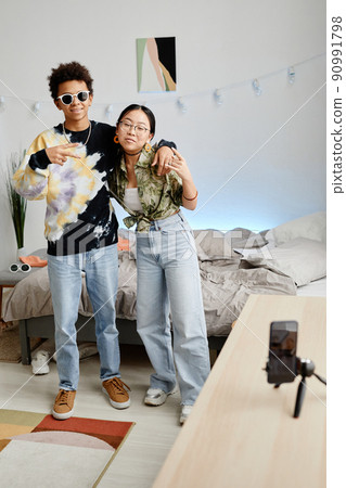 Two Teens Posing for Photo 90991798