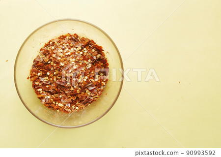 Chili flex powder in a bowl on table  90993592