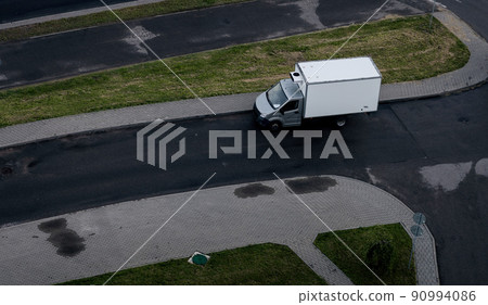 truck with empty mock up banner on a van. truck with empty mock up banner on a van. 90994086