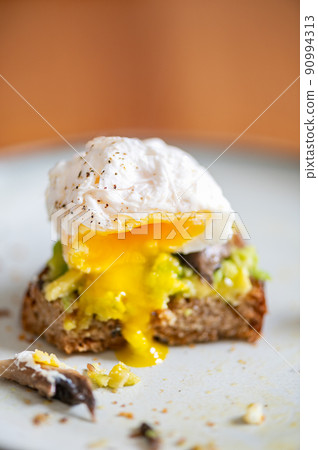 Healthy breakfast from poached eggs and mushrooms 90994313