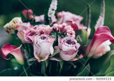 Bouquet from roses and cala lilies Bouquet from roses and cala lilies 90994319
