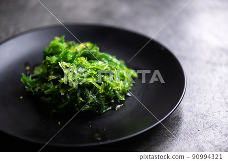 Seaweed Salad in black plate Seaweed Salad in black plate 90994321