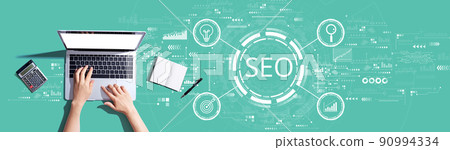 SEO concept with person using a laptop 90994334