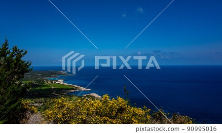 Green mountainous coast of the Mediterranean Sea on the Akamas Peninsula in the northwest of the island of Cyprus. Green mountainous coast of the Mediterranean Sea on the Akamas Peninsula in the northwest of the island of Cyprus. 90995016