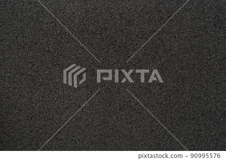 Black sponge structure texture 90995576