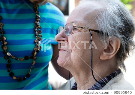 Close up portrait of an 83 year old senior woman Close up portrait of an 83 year old senior woman 90995940