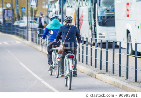 Cyclists on one of the streets in Stockholm. Cyclists on one of the streets in Stockholm. 90995981
