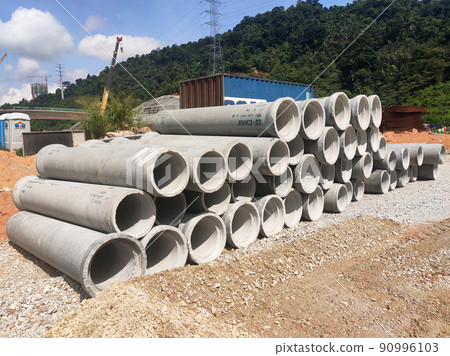 KUALA LUMPUR, MALAYSIA -MAY 13, 2020: Precast concrete culvert at the construction site. The material is shipped by the manufacturer and is ready for installation. Made of reinforced concrete 90996103