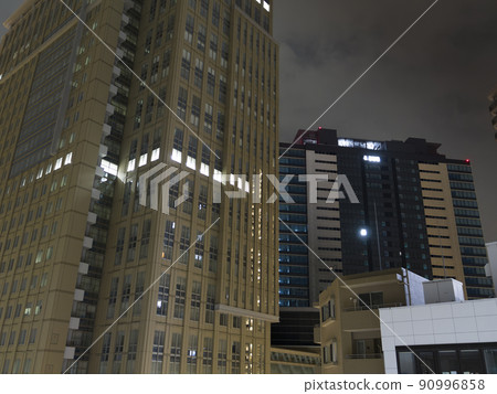 Midnight high-rise office building 90996858