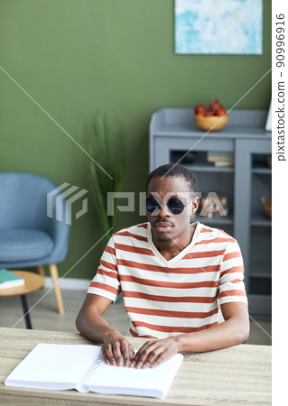 African American Blind Man Reading 90996916