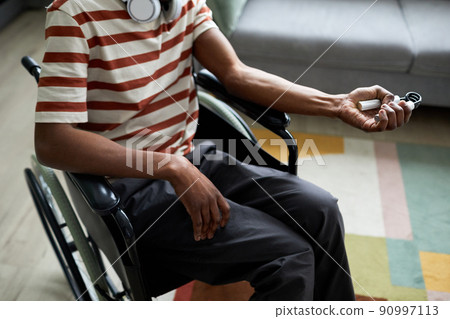 Man with Disability using Hand Expander 90997113