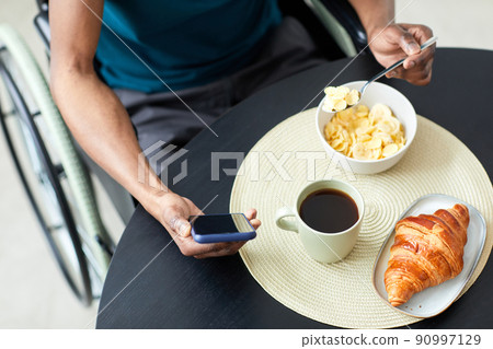 Man with Disability at Breakfast Closeup 90997129