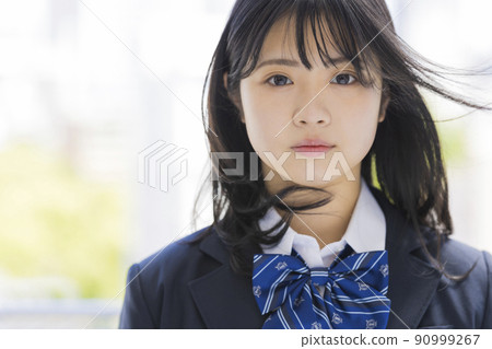 Schoolgirl in uniform High school junior high school 90999267