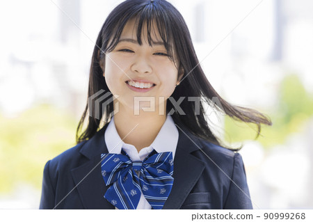 Schoolgirl in uniform High school junior high school 90999268