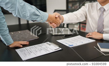Recruitment concept, Male employer shaking hands with applicant to congratulation for new job Recruitment concept, Male employer shaking hands with applicant to congratulation for new job 91004599