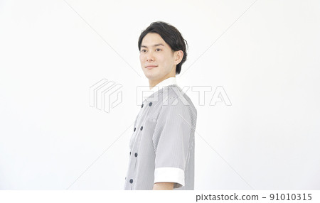 Portrait of a male chef on a white background Portrait of a male chef on a white background 91010315