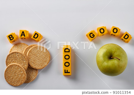 Flat lay concept of good and bad food. Flat lay concept of good and bad food. 91011354