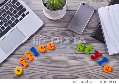 Top view office desk table with a lot of things. 91011644