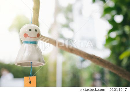 rain doll hanging in garden rain doll hanging in garden 91011947
