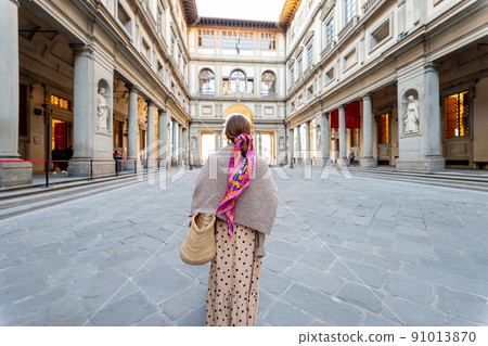 Woman visiting architectural landmarks of Florence city, Italy 91013870