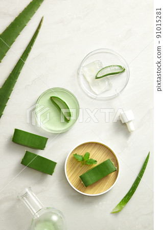 Aloe vera extract research in laboratory with a petri dish dropper in white background for aloe vera research advertising , photography science content 91015281