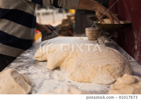 mass of yeast dough in the bakery 91017673