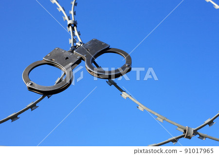 Old Handcuffs On Razor Wire Old Handcuffs On Razor Wire 91017965