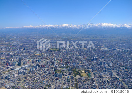 Aerial view, spring Tateyama mountain range and Toyama city 91018046