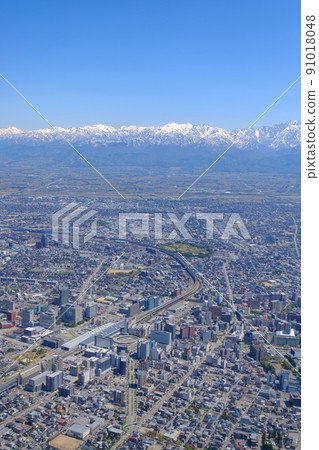 Aerial view, spring Tateyama mountain range and Toyama city 91018048