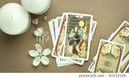 Blurred Esoteric concept and astrology, Fortune telling tarot predictions background, Tarot cards the eight of pentacles Blurred Esoteric concept and astrology, Fortune telling tarot predictions background, Tarot cards the eight of pentacles 91018186