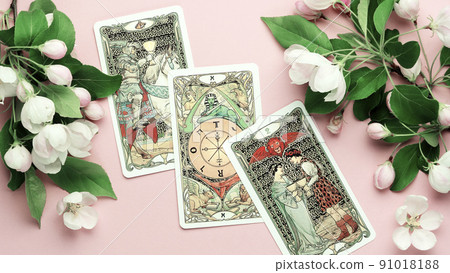 Blurred Tarot cards layout on witch table. Esoteric concept and astrology 91018188