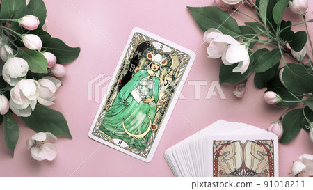 Blurred Tarot cards layout on witch table. Esoteric concept and astrology 91018211