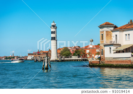 Ancient Lighthouse in Murano Island - Ferry Station in Venice Italy Ancient Lighthouse in Murano Island - Ferry Station in Venice Italy 91019414