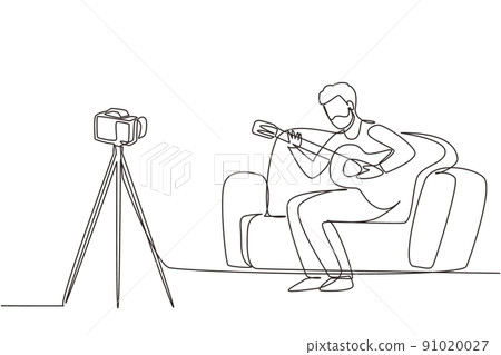 Single one line drawing Arabic man recording video of his playing guitar by camera on tripod. Male vlogger influencer performing music for show to streaming digital. Continuous line draw design vector Single one line drawing Arabic man recording video of his playing guitar by camera on tripod. Male vlogger influencer performing music for show to streaming digital. Continuous line draw design vector 91020027