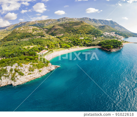 Queen's Beach in Milocer, Montenegro. Aerial view of sea waves and fantastic Rocky coast, Montenegro 91022618