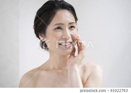 Beauty image portrait of a woman in her early 50s Beauty image portrait of a woman in her early 50s 91022763