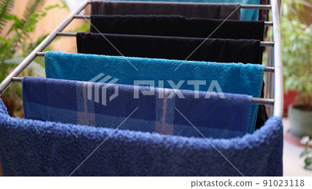 Metal clothes dryer with towels and clothing 91023118