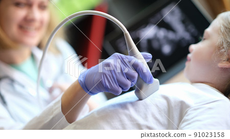 Diagnostic examination of internal organs in children using ultrasound machine Diagnostic examination of internal organs in children using ultrasound machine 91023158