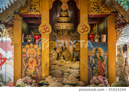 Holy Buddha statue in Lanna period located in Wat Phra That Doi Kham in Chiang Mai province of Thailand. Holy Buddha statue in Lanna period located in Wat Phra That Doi Kham in Chiang Mai province of Thailand. 91024284