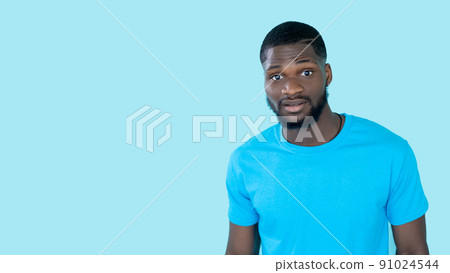 Confused man. Uncertain emotion. Support banner. Clueless doubtful unsure young guy isolated on blue copy space studio background. Confused man. Uncertain emotion. Support banner. Clueless doubtful unsure young guy isolated on blue copy space studio background. 91024544