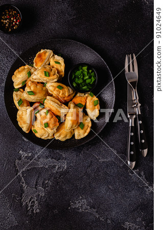 Dumplings, filled with mashed potatoes. 91024649