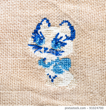 blue kitten embroidered by hand on fabric blue kitten embroidered by hand on fabric 91024700