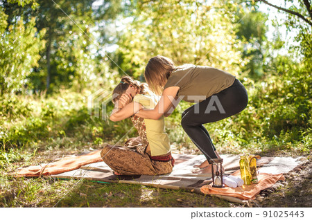 Master massage therapist provides a thorough massage in the outdoors. Master massage therapist provides a thorough massage in the outdoors. 91025443