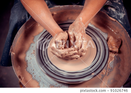 Ceramist girl sculpts from clay. Folk craft. Close-up. Ceramist girl sculpts from clay. Folk craft. Close-up. 91026746
